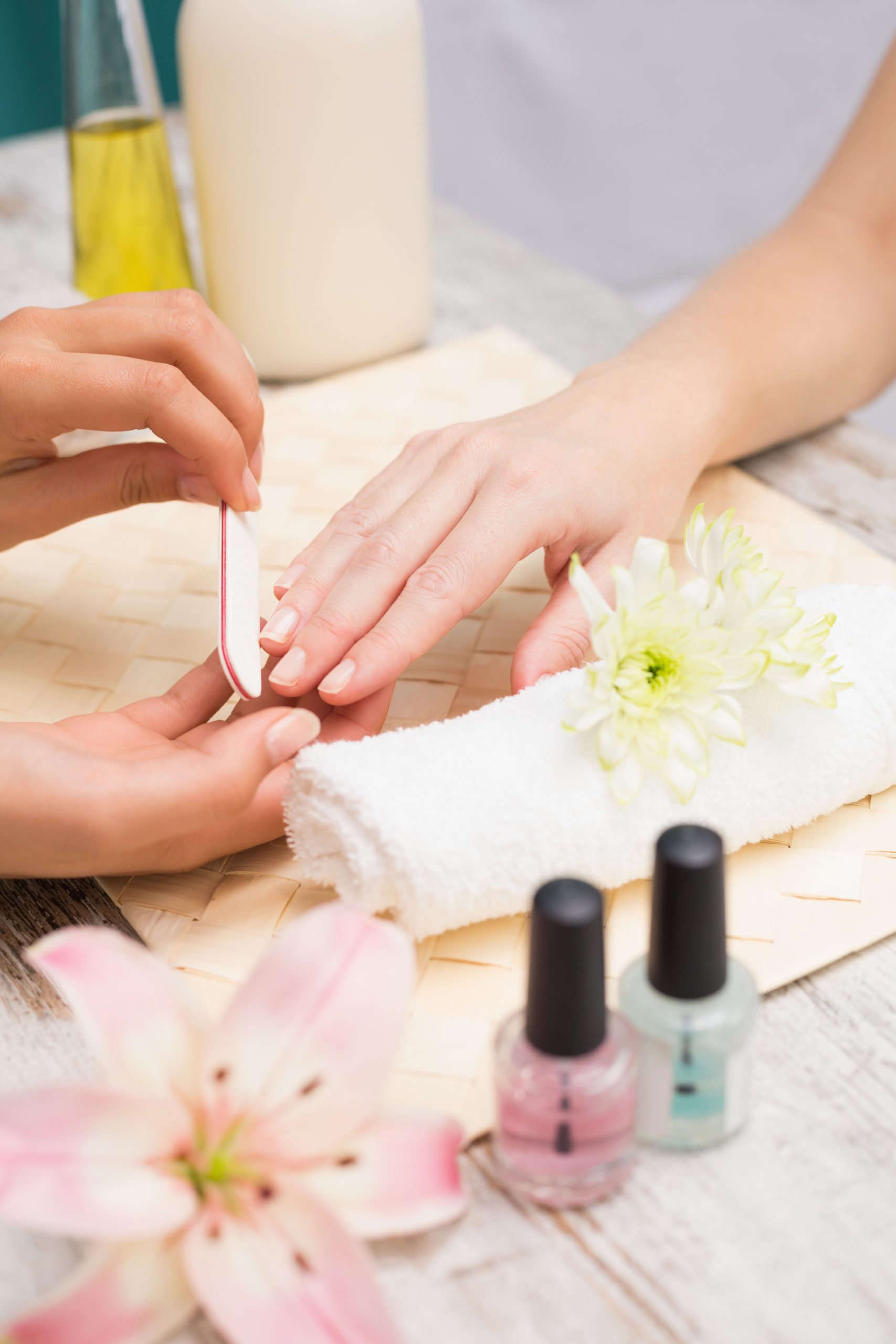 nail technician giving customer manicure scaled - Nail Salon 89502